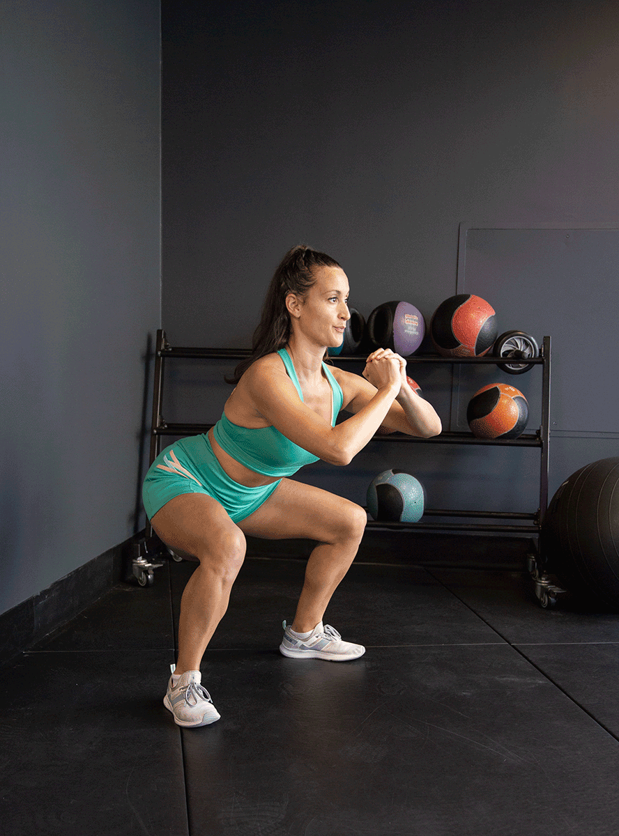 woman doing squats 