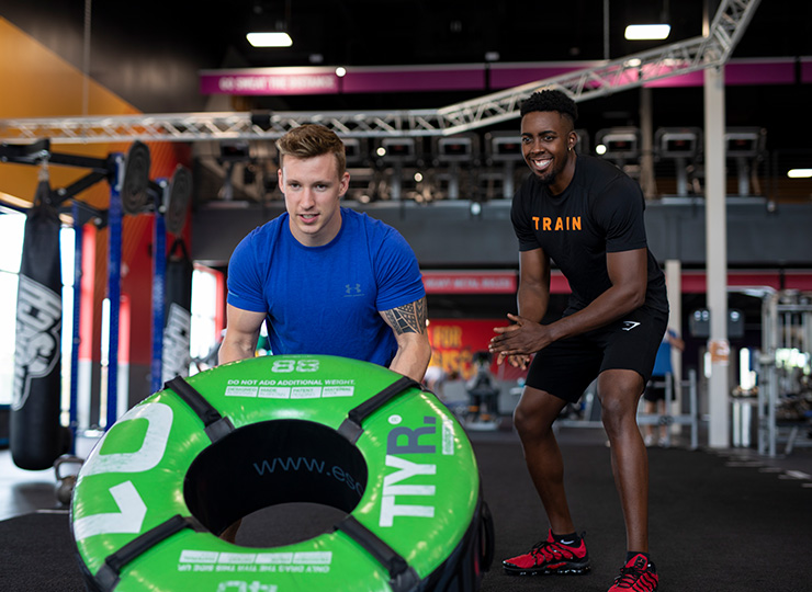 man with crunch personal trainer