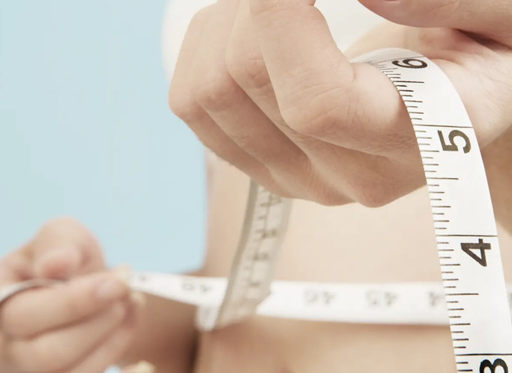 person checking their waist