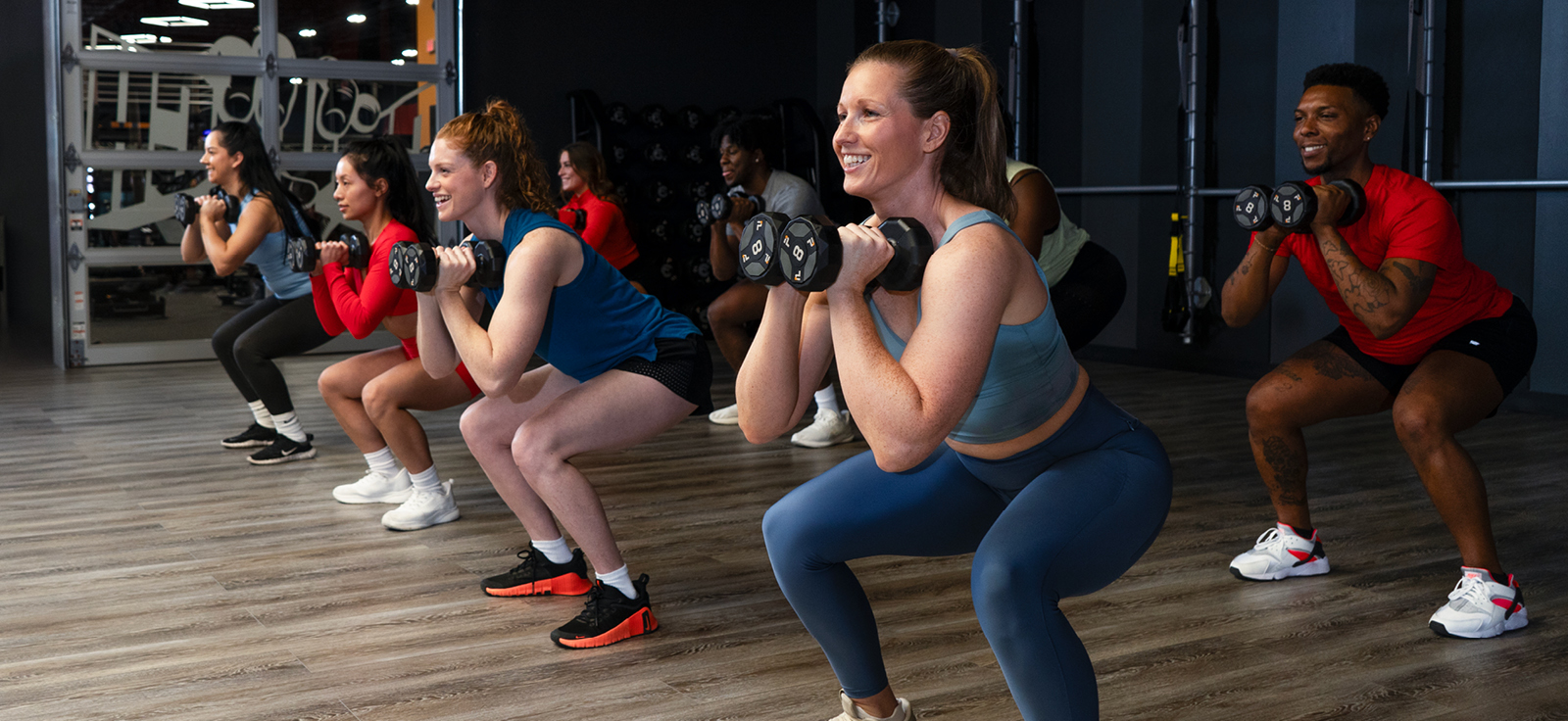 people in a crunch fitness class