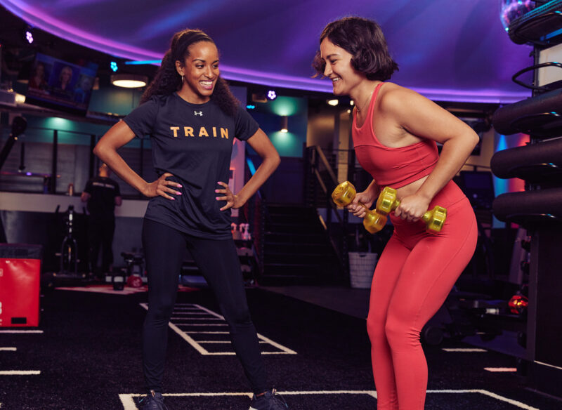 Personal trainer with her client