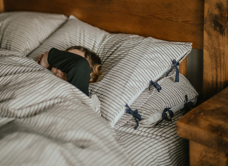 Woman sleeping in bed