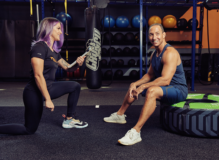 Personal trainer with their client