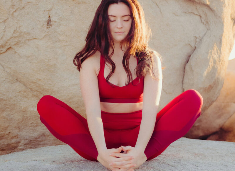 woman holding a yoga pose