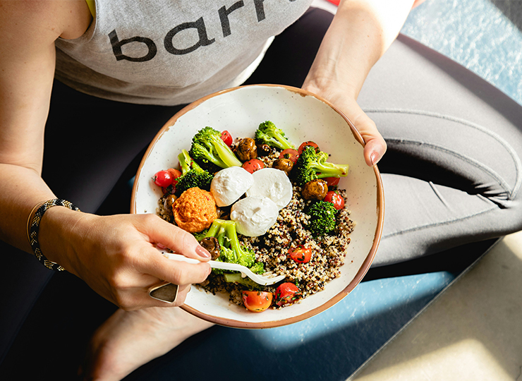 woman with a bowl of salad