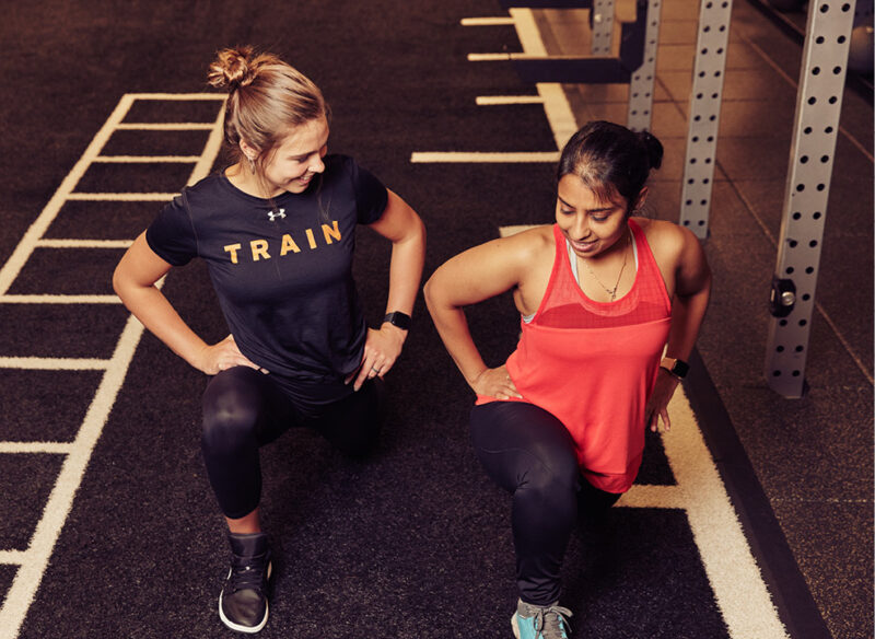woman with personal trainer