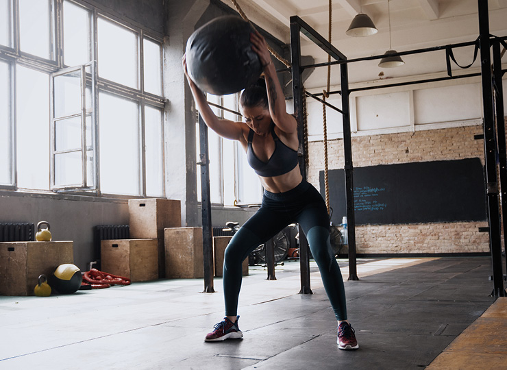 woman on battle ropes