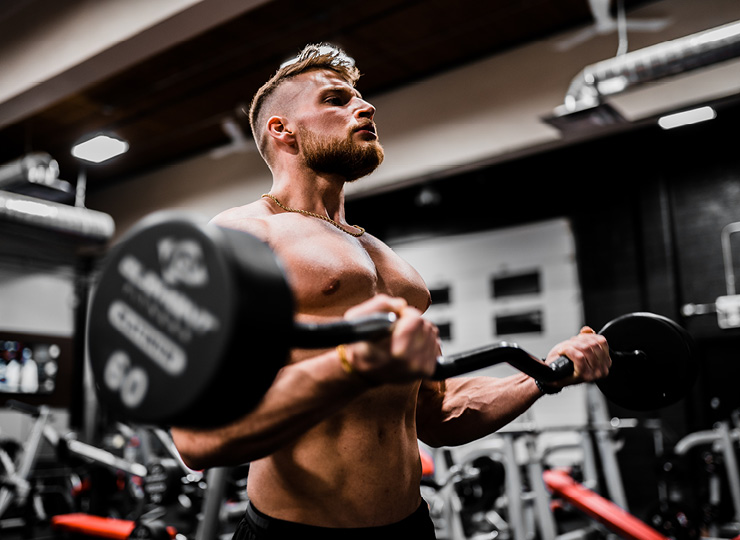 man lifting weights