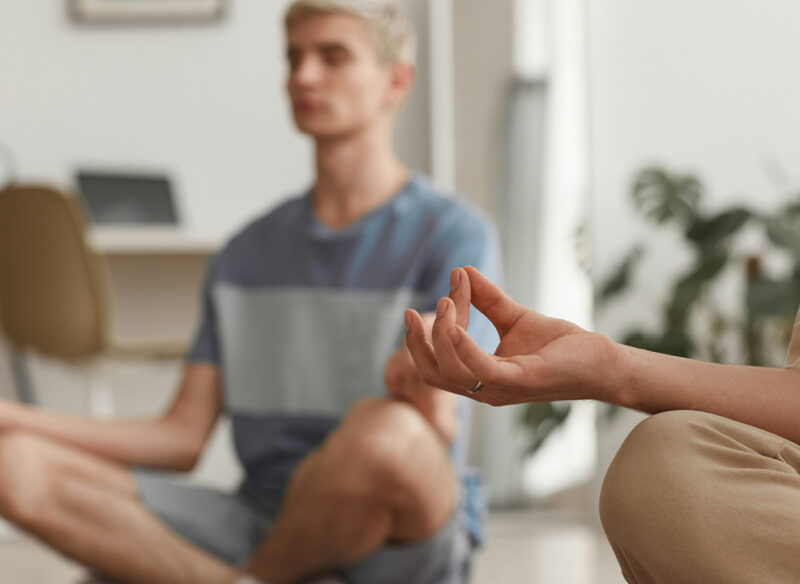 men in a yoga class